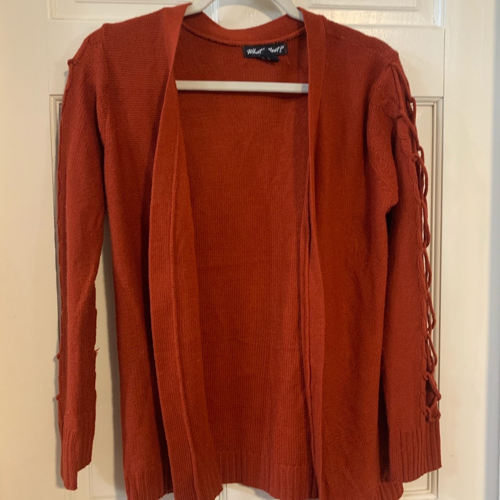 red criss cross sleeve sweater